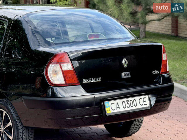 Черный Рено Клио, объемом двигателя 1.4 л и пробегом 210 тыс. км за 3999 $, фото 20 на Automoto.ua