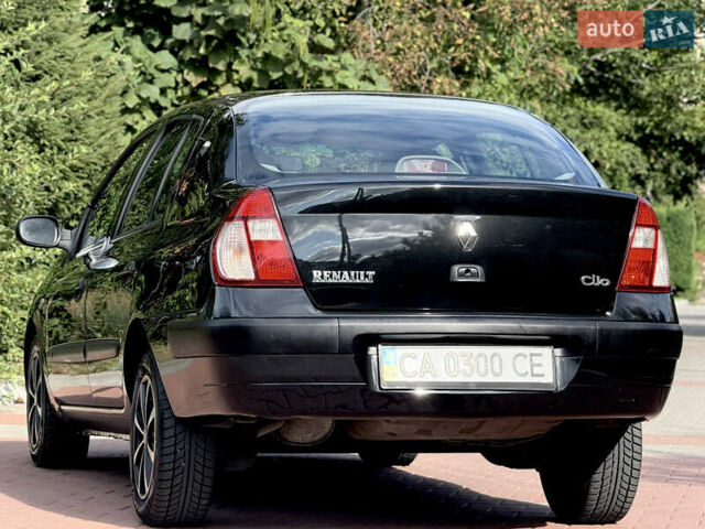 Черный Рено Клио, объемом двигателя 1.4 л и пробегом 210 тыс. км за 3999 $, фото 24 на Automoto.ua