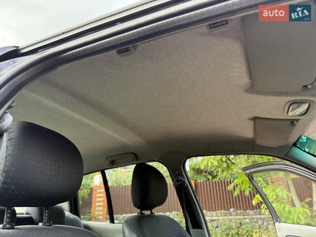 Черный Рено Клио, объемом двигателя 1.4 л и пробегом 210 тыс. км за 3999 $, фото 48 на Automoto.ua