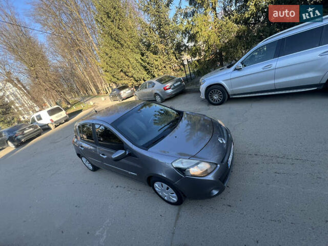 Коричневый Рено Клио, объемом двигателя 1.5 л и пробегом 279 тыс. км за 4950 $, фото 7 на Automoto.ua