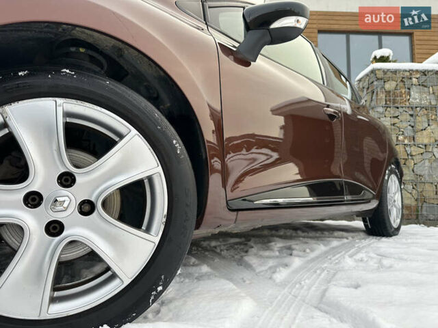 Коричневый Рено Клио, объемом двигателя 1.2 л и пробегом 146 тыс. км за 7699 $, фото 12 на Automoto.ua