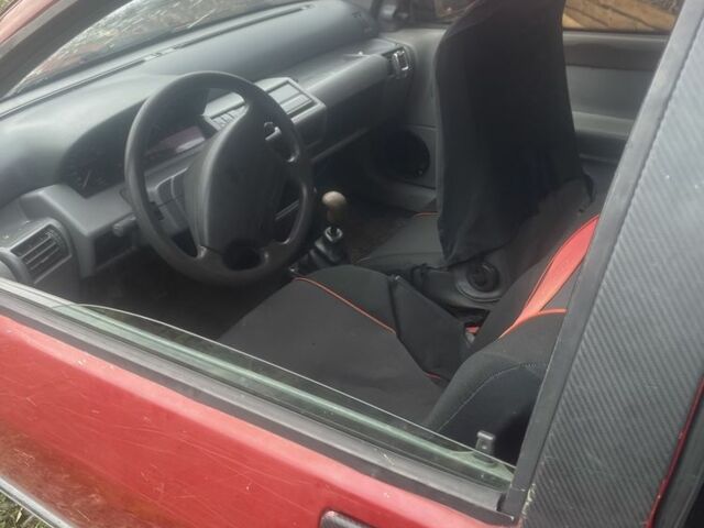 Красный Рено Клио, объемом двигателя 1.1 л и пробегом 280 тыс. км за 480 $, фото 5 на Automoto.ua