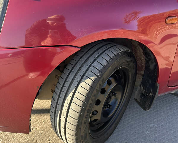 Червоний Рено Кліо, об'ємом двигуна 1.39 л та пробігом 141 тис. км за 3650 $, фото 6 на Automoto.ua