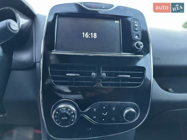 Красный Рено Клио, объемом двигателя 1.5 л и пробегом 195 тыс. км за 9300 $, фото 23 на Automoto.ua