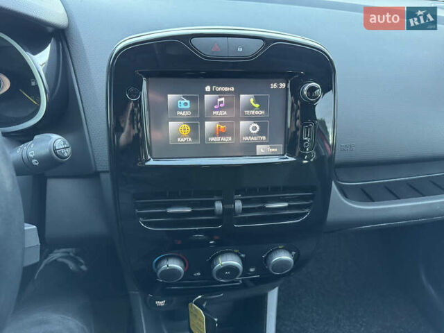 Рено Кліо 2015 у Дубно на Automoto.ua Червоний Рено Кліо, об'ємом двигуна 1.5 л та пробігом 200 тис. км за 8350 $, фото 76 на Automoto.ua