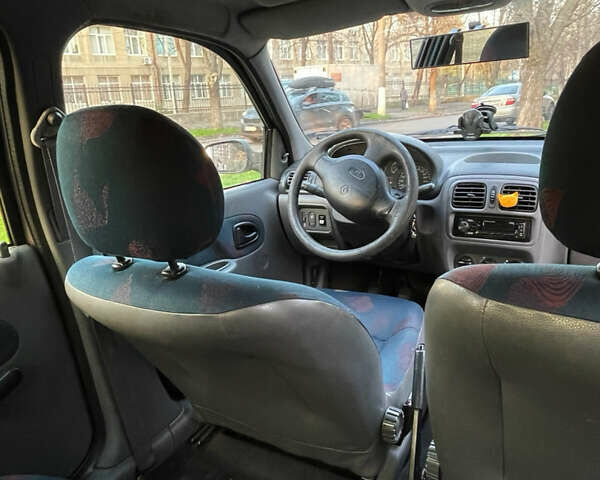 Серый Рено Клио, объемом двигателя 1.4 л и пробегом 200 тыс. км за 3500 $, фото 14 на Automoto.ua