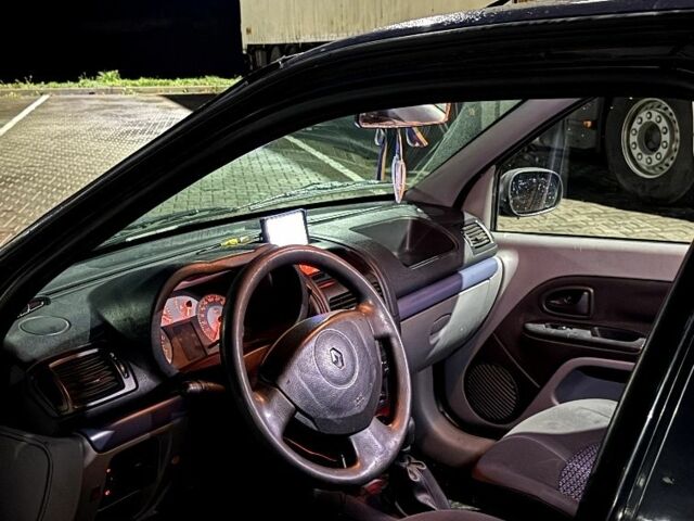 Серый Рено Клио, объемом двигателя 1.4 л и пробегом 291 тыс. км за 2870 $, фото 11 на Automoto.ua