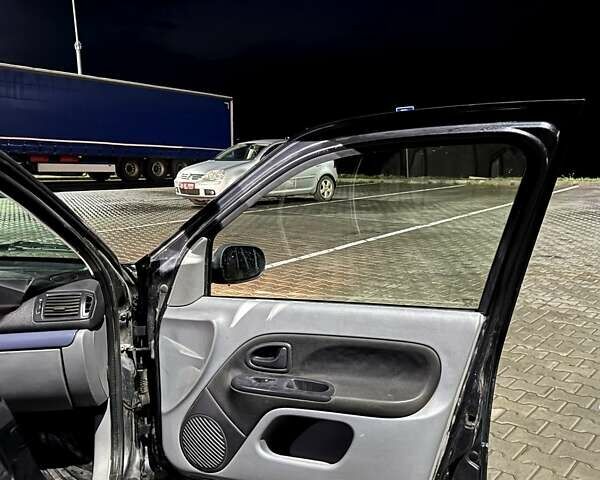 Сірий Рено Кліо, об'ємом двигуна 1.4 л та пробігом 291 тис. км за 2870 $, фото 51 на Automoto.ua