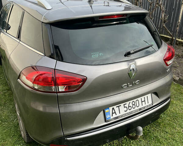 Серый Рено Клио, объемом двигателя 1.5 л и пробегом 231 тыс. км за 7999 $, фото 2 на Automoto.ua