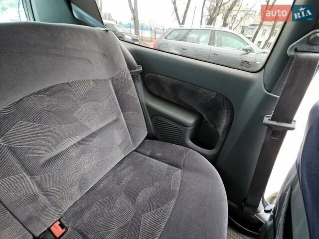 Синий Рено Клио, объемом двигателя 1.39 л и пробегом 230 тыс. км за 2999 $, фото 11 на Automoto.ua
