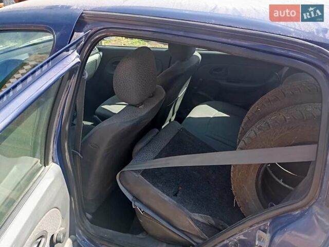 Синий Рено Клио, объемом двигателя 1.2 л и пробегом 235 тыс. км за 2500 $, фото 3 на Automoto.ua