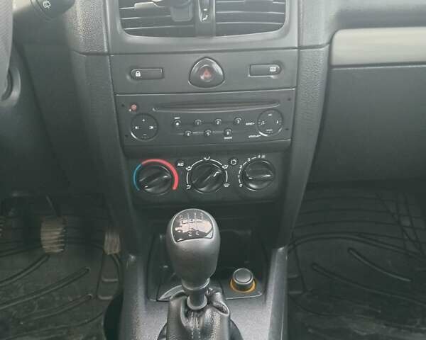 Синий Рено Клио, объемом двигателя 1.2 л и пробегом 295 тыс. км за 2999 $, фото 12 на Automoto.ua