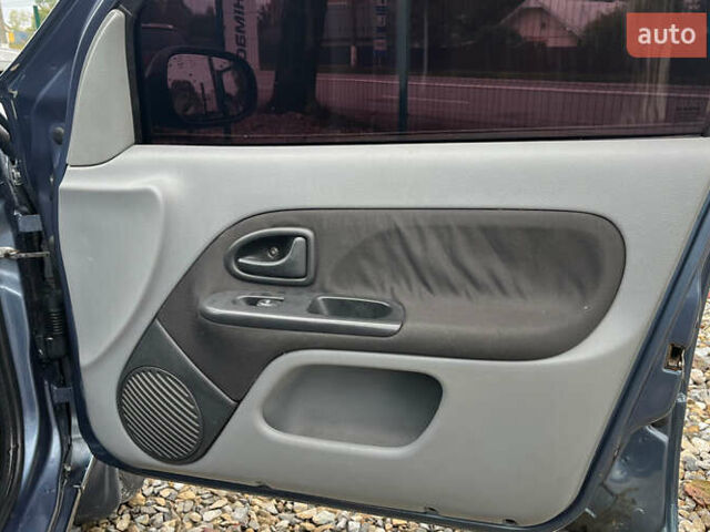 Синій Рено Кліо, об'ємом двигуна 1.39 л та пробігом 211 тис. км за 3400 $, фото 23 на Automoto.ua