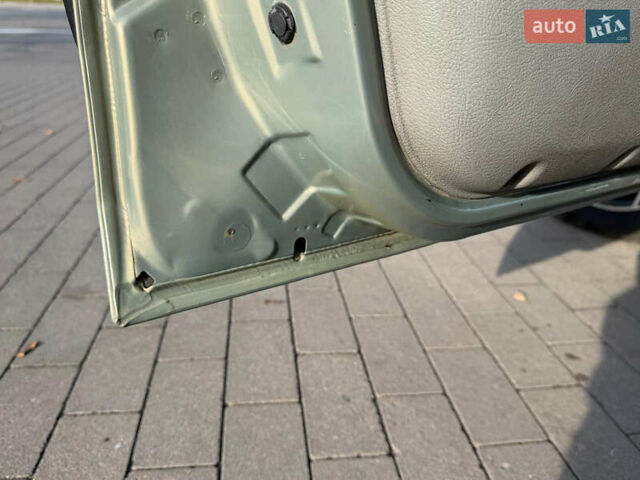 Зелений Рено Кліо, об'ємом двигуна 1.39 л та пробігом 156 тис. км за 3950 $, фото 16 на Automoto.ua