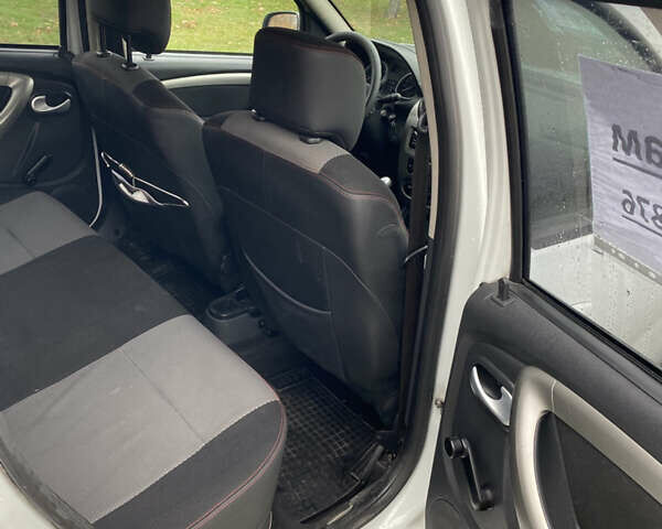 Белый Рено Дастер, объемом двигателя 1.6 л и пробегом 223 тыс. км за 6899 $, фото 19 на Automoto.ua