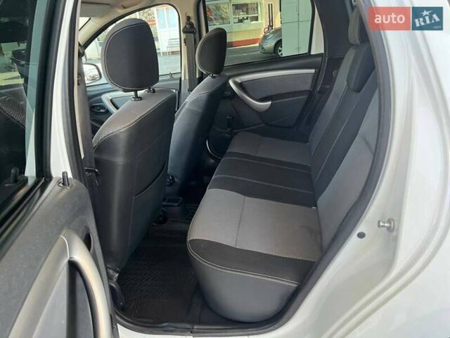 Белый Рено Дастер, объемом двигателя 2 л и пробегом 93 тыс. км за 9600 $, фото 15 на Automoto.ua