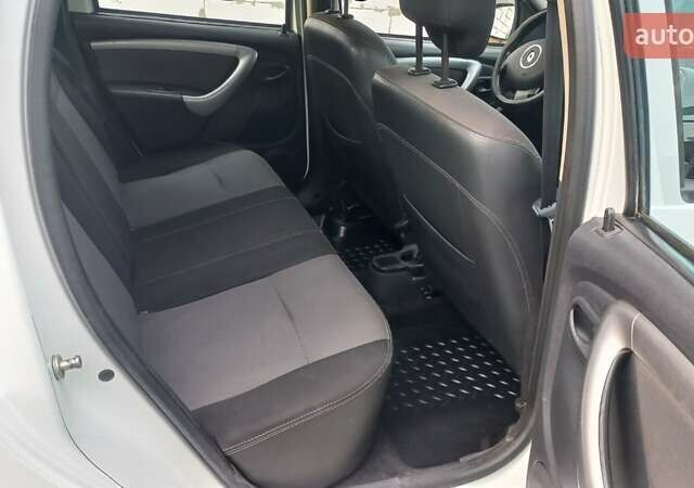 Білий Рено Дастер, об'ємом двигуна 1.46 л та пробігом 148 тис. км за 9200 $, фото 11 на Automoto.ua