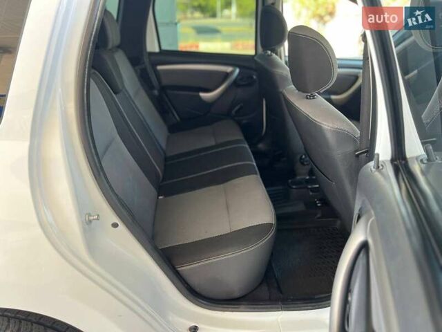 Белый Рено Дастер, объемом двигателя 2 л и пробегом 93 тыс. км за 9600 $, фото 22 на Automoto.ua