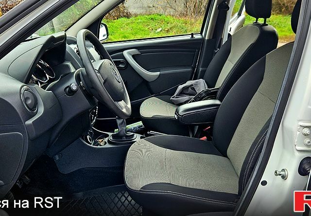 Білий Рено Дастер, об'ємом двигуна 1.5 л та пробігом 74 тис. км за 10300 $, фото 5 на Automoto.ua