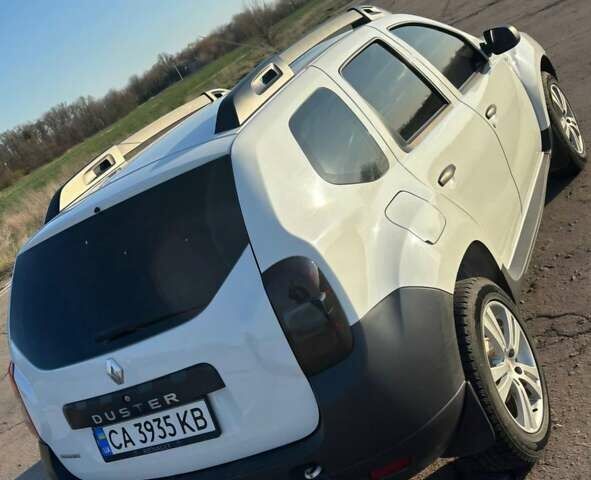 Белый Рено Дастер, объемом двигателя 1.46 л и пробегом 183 тыс. км за 11650 $, фото 4 на Automoto.ua