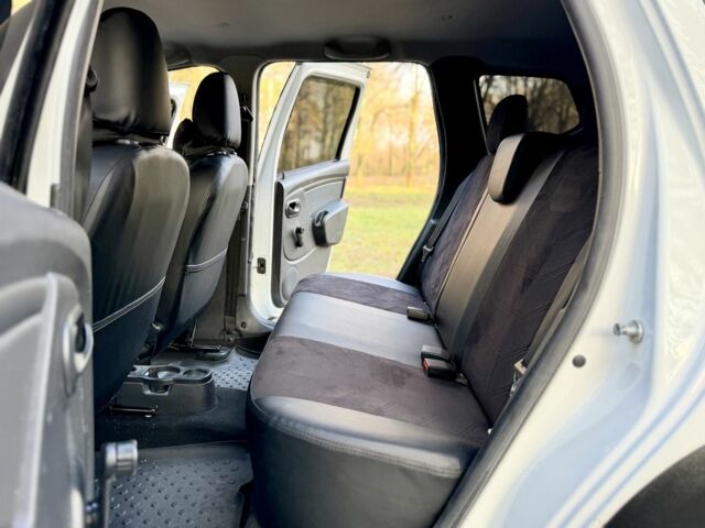 Білий Рено Дастер, об'ємом двигуна 1.5 л та пробігом 87 тис. км за 12700 $, фото 11 на Automoto.ua