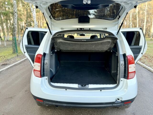 Білий Рено Дастер, об'ємом двигуна 1.5 л та пробігом 87 тис. км за 12700 $, фото 14 на Automoto.ua