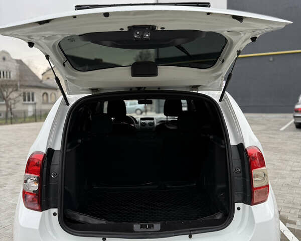 Белый Рено Дастер, объемом двигателя 1.5 л и пробегом 218 тыс. км за 9500 $, фото 26 на Automoto.ua