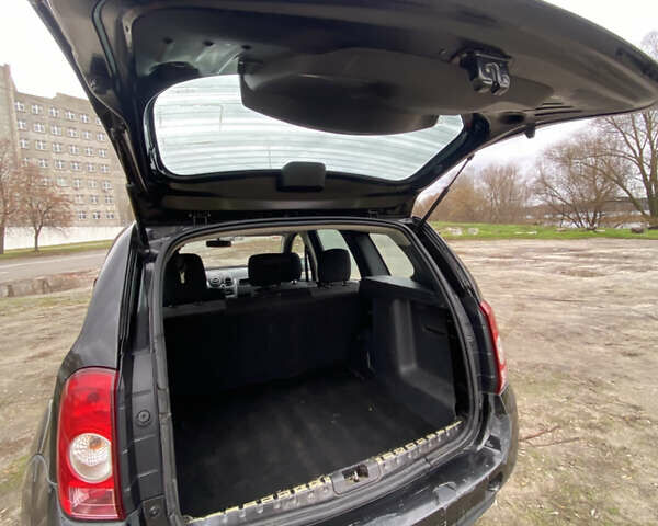 Чорний Рено Дастер, об'ємом двигуна 1.6 л та пробігом 283 тис. км за 6800 $, фото 13 на Automoto.ua