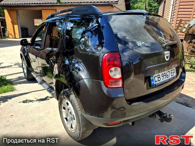 Черный Рено Дастер, объемом двигателя 1.5 л и пробегом 220 тыс. км за 7500 $, фото 2 на Automoto.ua