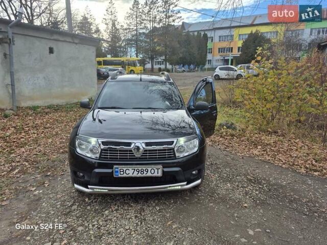 Черный Рено Дастер, объемом двигателя 1.6 л и пробегом 94 тыс. км за 8900 $, фото 1 на Automoto.ua