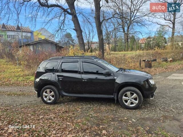 Черный Рено Дастер, объемом двигателя 1.6 л и пробегом 94 тыс. км за 8900 $, фото 12 на Automoto.ua