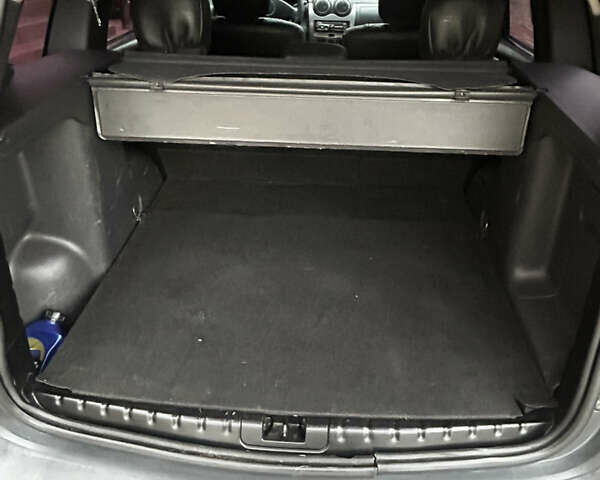 Черный Рено Дастер, объемом двигателя 1.46 л и пробегом 171 тыс. км за 8900 $, фото 1 на Automoto.ua