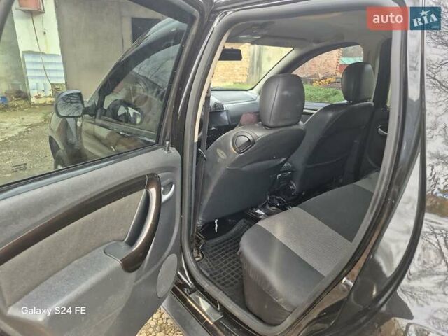 Черный Рено Дастер, объемом двигателя 1.6 л и пробегом 94 тыс. км за 8900 $, фото 5 на Automoto.ua