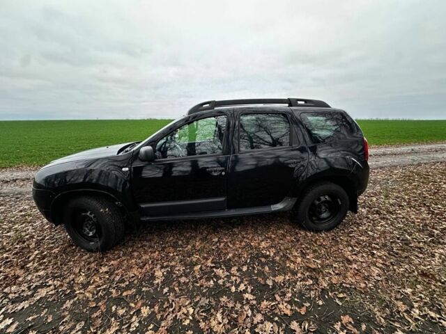 Черный Рено Дастер, объемом двигателя 1.6 л и пробегом 198 тыс. км за 6700 $, фото 2 на Automoto.ua