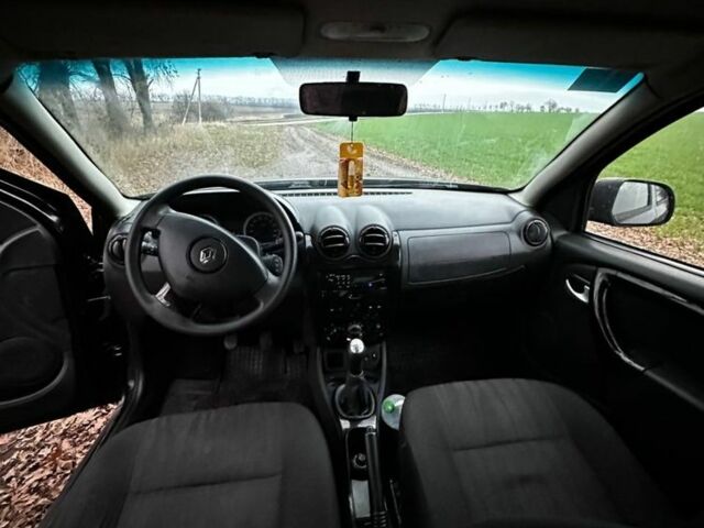 Черный Рено Дастер, объемом двигателя 1.6 л и пробегом 198 тыс. км за 6700 $, фото 1 на Automoto.ua