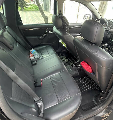 Черный Рено Дастер, объемом двигателя 1.6 л и пробегом 84 тыс. км за 9000 $, фото 10 на Automoto.ua