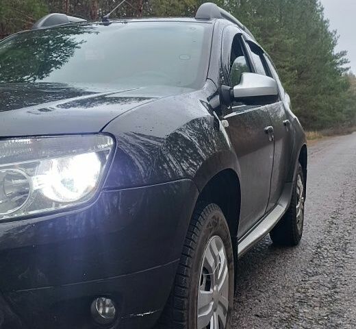 Черный Рено Дастер, объемом двигателя 2 л и пробегом 169 тыс. км за 9500 $, фото 1 на Automoto.ua