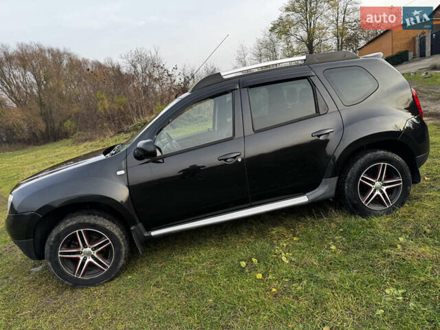 Чорний Рено Дастер, об'ємом двигуна 1.6 л та пробігом 166 тис. км за 9700 $, фото 2 на Automoto.ua