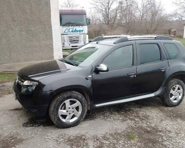 Черный Рено Дастер, объемом двигателя 1.46 л и пробегом 242 тыс. км за 7900 $, фото 4 на Automoto.ua