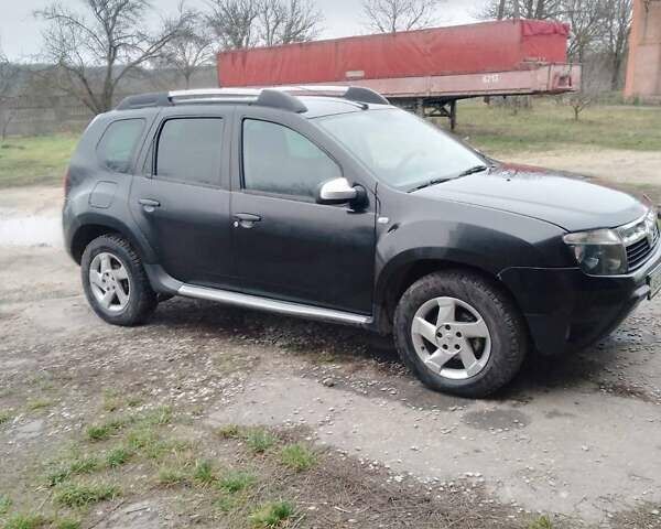 Черный Рено Дастер, объемом двигателя 1.46 л и пробегом 242 тыс. км за 7900 $, фото 1 на Automoto.ua