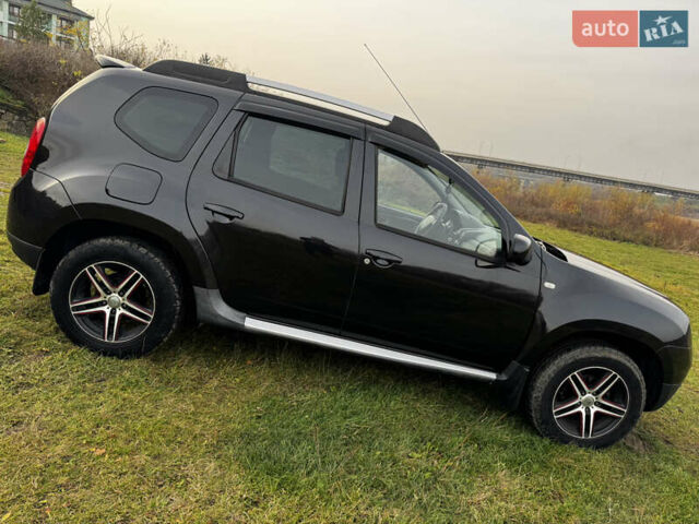 Чорний Рено Дастер, об'ємом двигуна 1.6 л та пробігом 166 тис. км за 9700 $, фото 13 на Automoto.ua