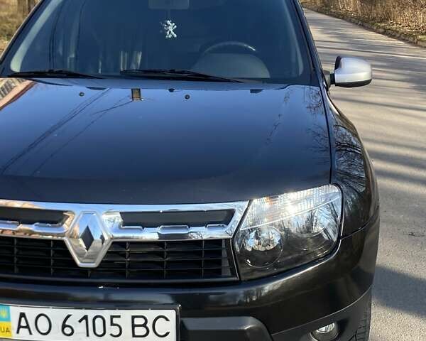 Черный Рено Дастер, объемом двигателя 1.6 л и пробегом 191 тыс. км за 8500 $, фото 2 на Automoto.ua