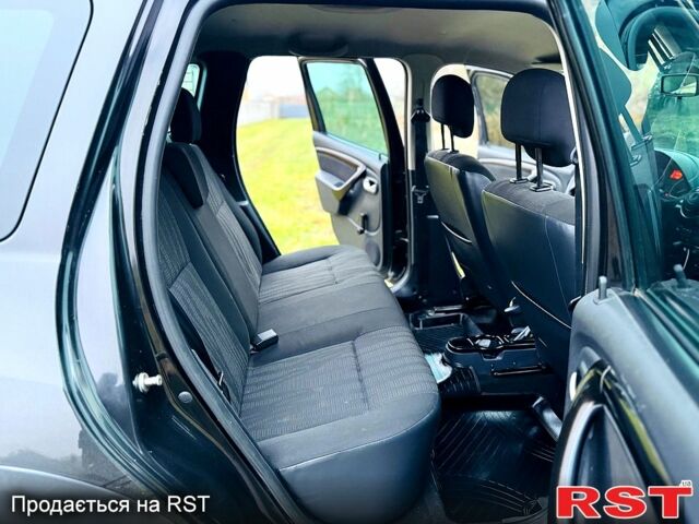 Черный Рено Дастер, объемом двигателя 1.5 л и пробегом 73 тыс. км за 12300 $, фото 11 на Automoto.ua