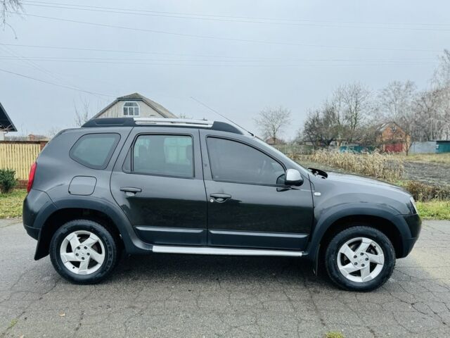 Чорний Рено Дастер, об'ємом двигуна 1.5 л та пробігом 73 тис. км за 12300 $, фото 1 на Automoto.ua