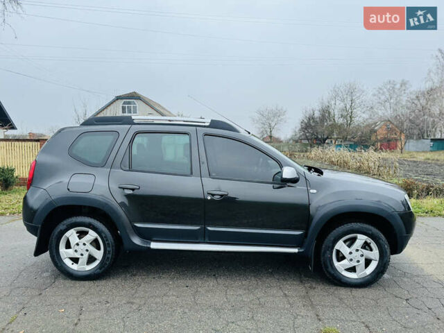 Черный Рено Дастер, объемом двигателя 1.5 л и пробегом 73 тыс. км за 12300 $, фото 1 на Automoto.ua