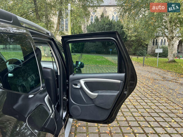 Черный Рено Дастер, объемом двигателя 1.6 л и пробегом 140 тыс. км за 9200 $, фото 16 на Automoto.ua