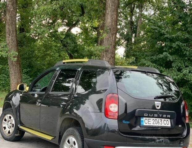 Черный Рено Дастер, объемом двигателя 1.5 л и пробегом 392 тыс. км за 7800 $, фото 2 на Automoto.ua