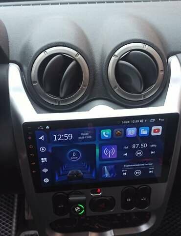 Черный Рено Дастер, объемом двигателя 2 л и пробегом 223 тыс. км за 10500 $, фото 1 на Automoto.ua