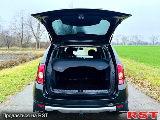 Черный Рено Дастер, объемом двигателя 1.5 л и пробегом 73 тыс. км за 12300 $, фото 12 на Automoto.ua