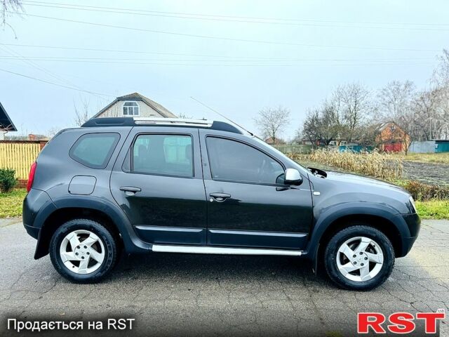 Черный Рено Дастер, объемом двигателя 1.5 л и пробегом 73 тыс. км за 12300 $, фото 1 на Automoto.ua